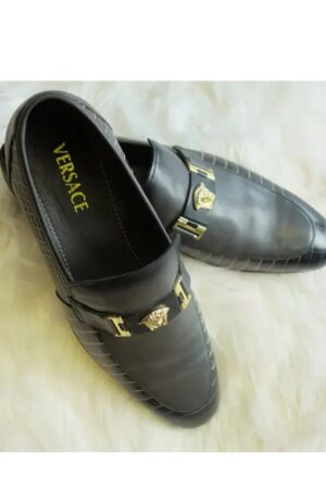 Stylish Black Leather Oxford Dress Shoe with Gold Accessories